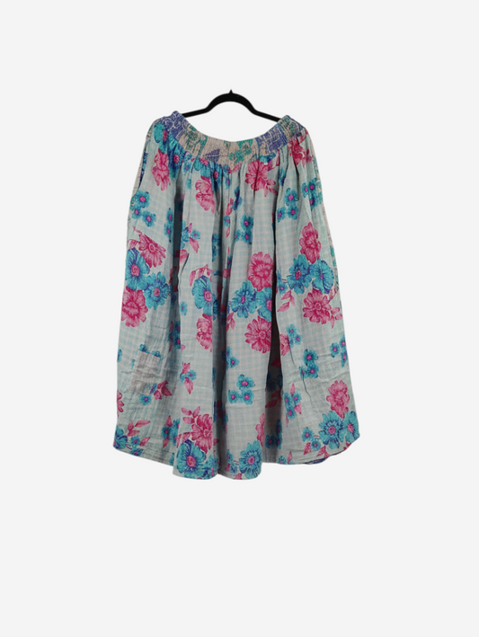 She Lives Beauty Pachuco Kantha capri pants in vintage cotton with a blue and pink floral pattern and pleated design.