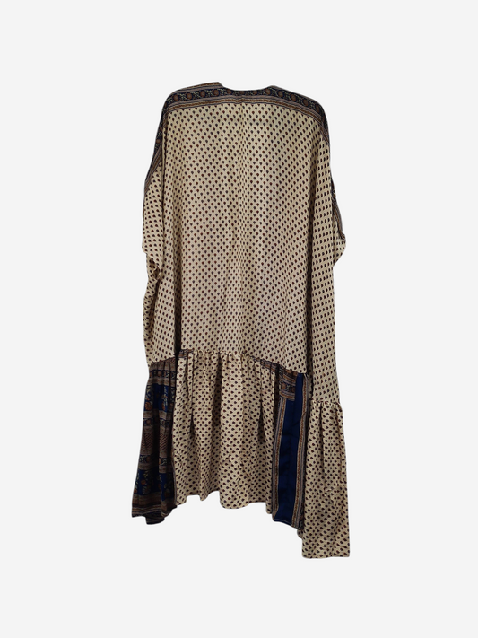 She Lives Beauty Winds of the Ancestors kimono in beige Rasgulla silk with blue patterned border and drop-waist hem.