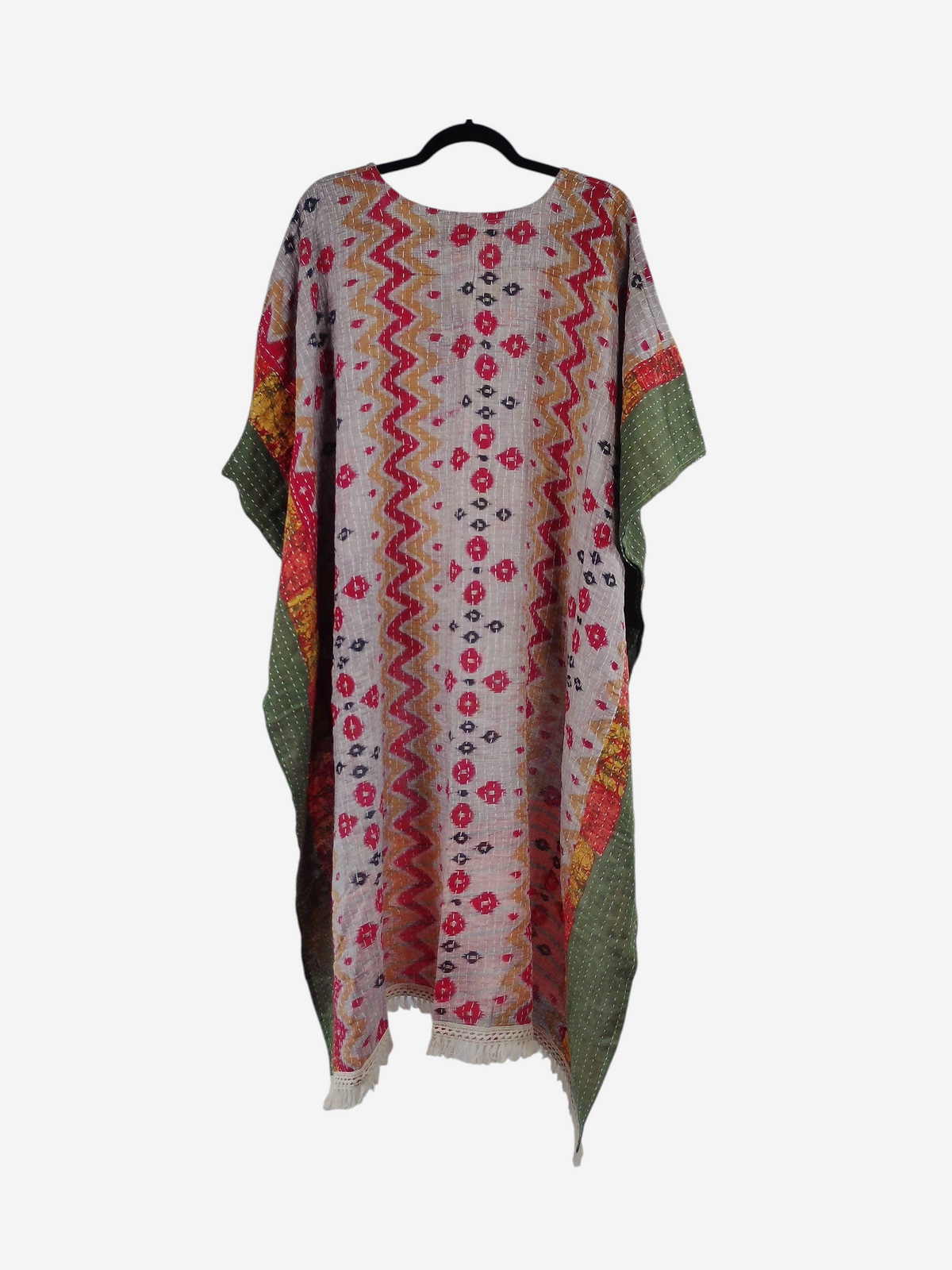 She Lives Beauty La Isla Bonita reversible kantha top in vintage cotton with colorful patterns and fringe trim.