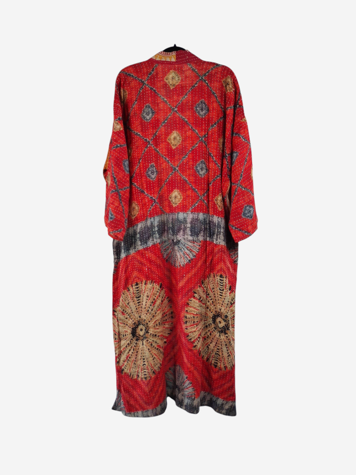She Lives Beauty Starlit Wanderer kimono in red vintage cotton with kantha stitching and circular patterned details.