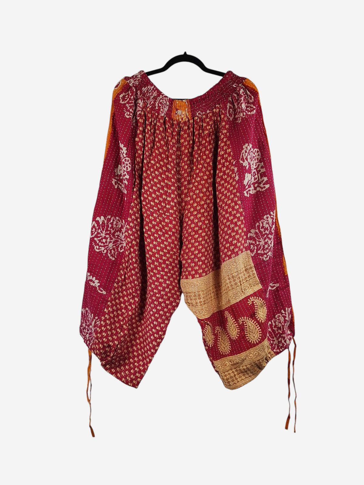 She Lives Beauty Roam Free capri joggers in red and orange vintage Kantha cotton with bohemian floral patterns.