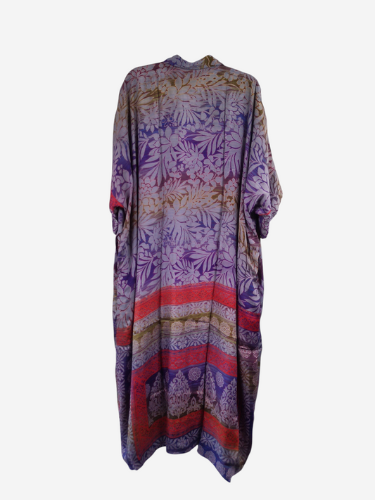 She Lives Beauty reversible kaftan in vintage purple and orange floral silk with a flowing bohemian silhouette.