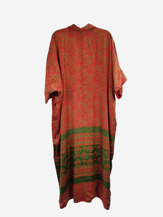 She Lives Beauty reversible kaftan in vintage red and green Rasgulla silk with a flowing bohemian floral pattern.