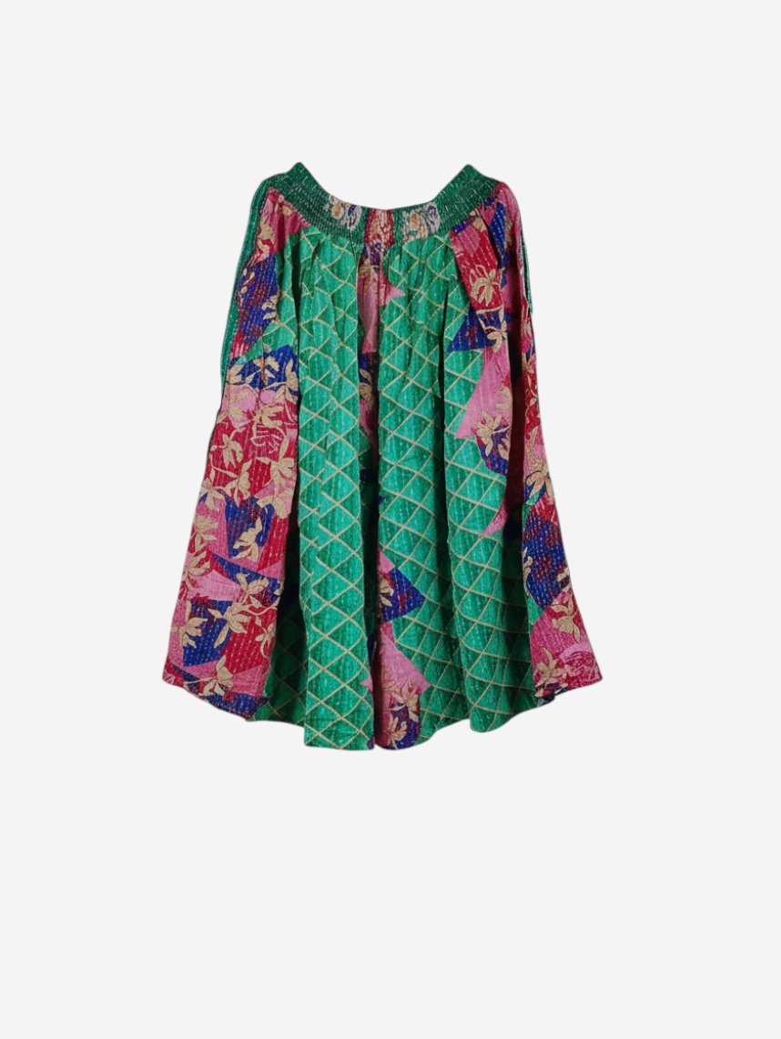 She Lives Beauty Pachuco Kantha capri pants in vibrant green and pink vintage cotton with intricate stitched patterns.