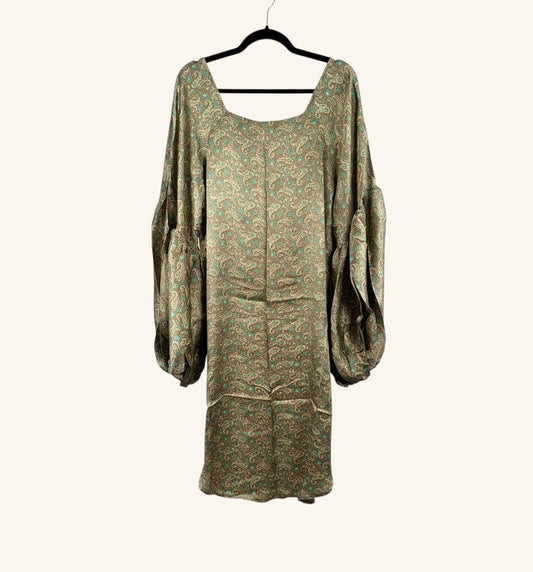 She Lives Beauty Desert Rain silk top with paisley print, oversized ruffle sleeves, and a flowing hi-low silhouette.