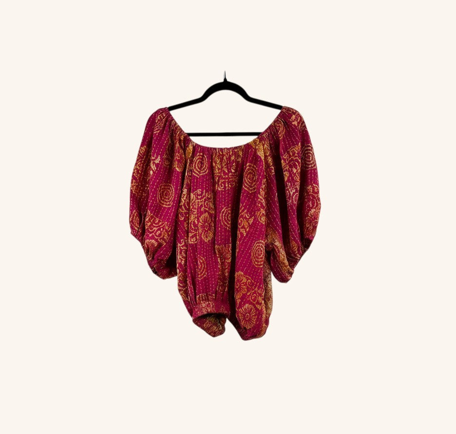 She Lives Beauty Wildflower Bloom Kantha top in magenta and gold vintage cotton with bubble sleeves on a hanger