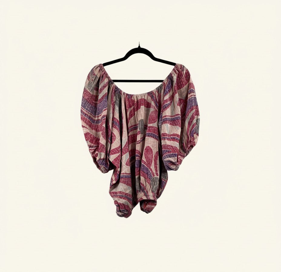 She Lives Beauty Wildflower Bloom Kantha top in vintage cotton with purple and red floral patterns and bubble sleeves.