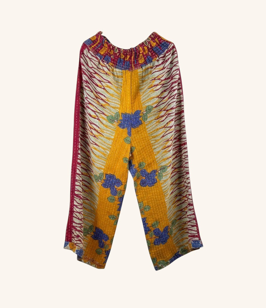 She Lives Beauty wide leg pants in yellow and maroon vintage kantha cotton with floral patterns and hand stitching.