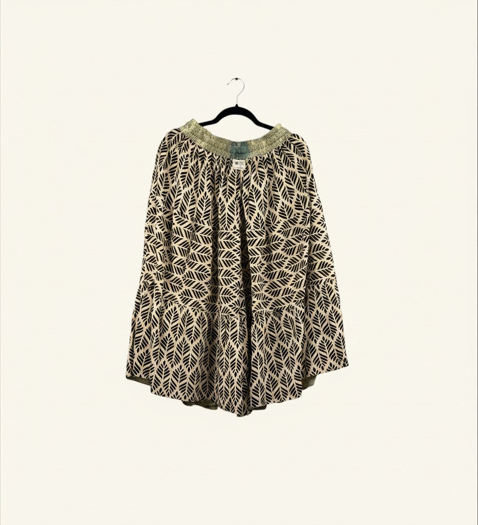 She Lives Beauty Earth Song reversible capri pants in beige and black leaf print vintage silk cotton on a hanger