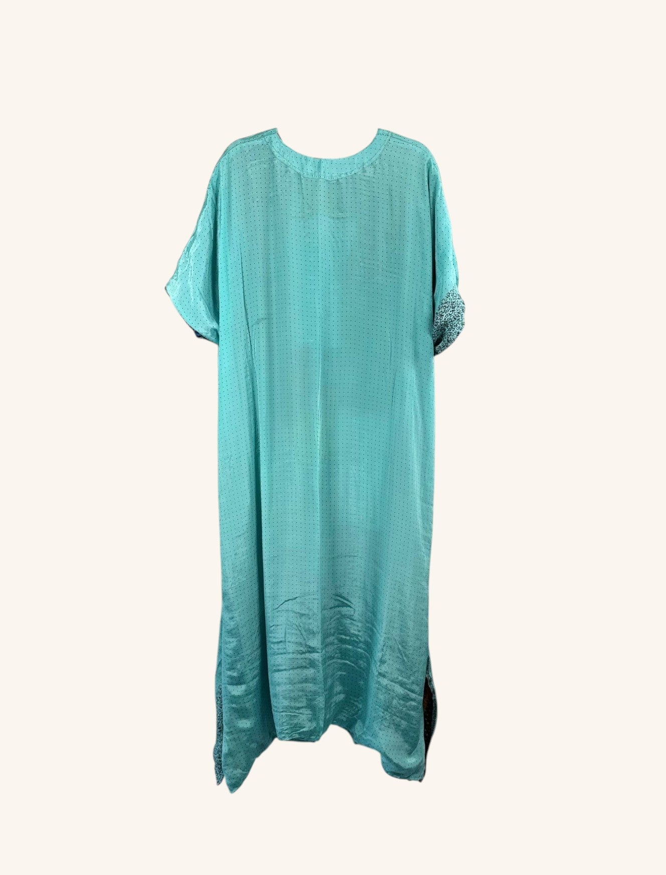 She Lives Beauty Luna Rosa reversible kaftan in turquoise vintage silk with subtle dot patterns and side slits.