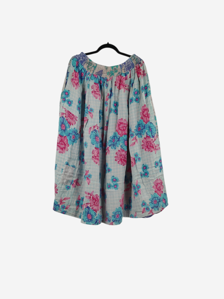 She Lives Beauty Pachuco Kantha capri pants in vintage cotton with a blue and pink floral pattern and pleated design.