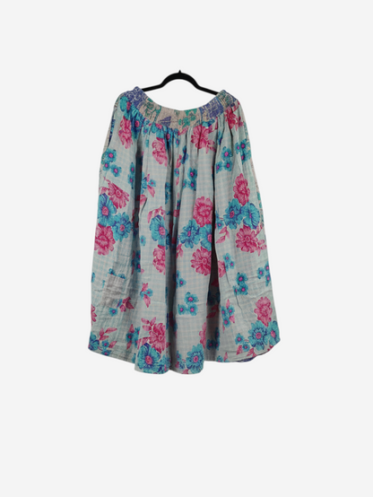She Lives Beauty Pachuco Kantha capri pants in vintage cotton with a blue and pink floral pattern and pleated design.