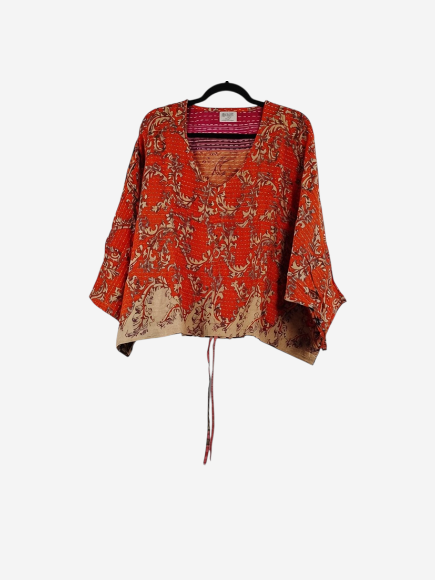 She Lives Beauty Sunrise Hana butterfly top in vibrant orange vintage kantha cotton with intricate floral patterns.