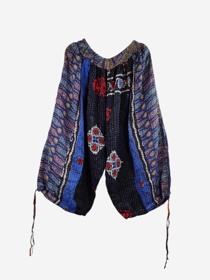 She Lives Beauty vintage cotton kantha capri joggers featuring blue and black patchwork patterns and hand stitching.