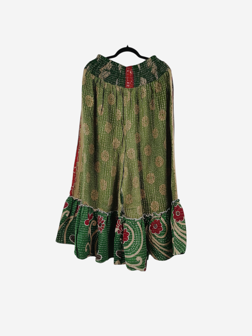 She Lives Beauty Anything for Selenas pants in green vintage Kantha cotton with floral patterns and a ruffled hem.