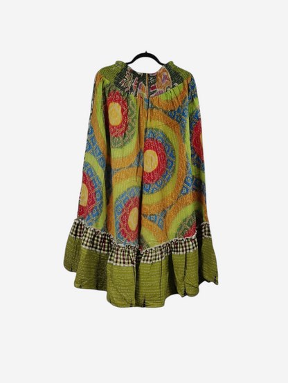 She Lives Beauty Anything for Selenas pants in green vintage Kantha cotton with a vibrant circular print and ruffle hem.