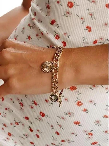 Susie's Gold Charm Bracelet