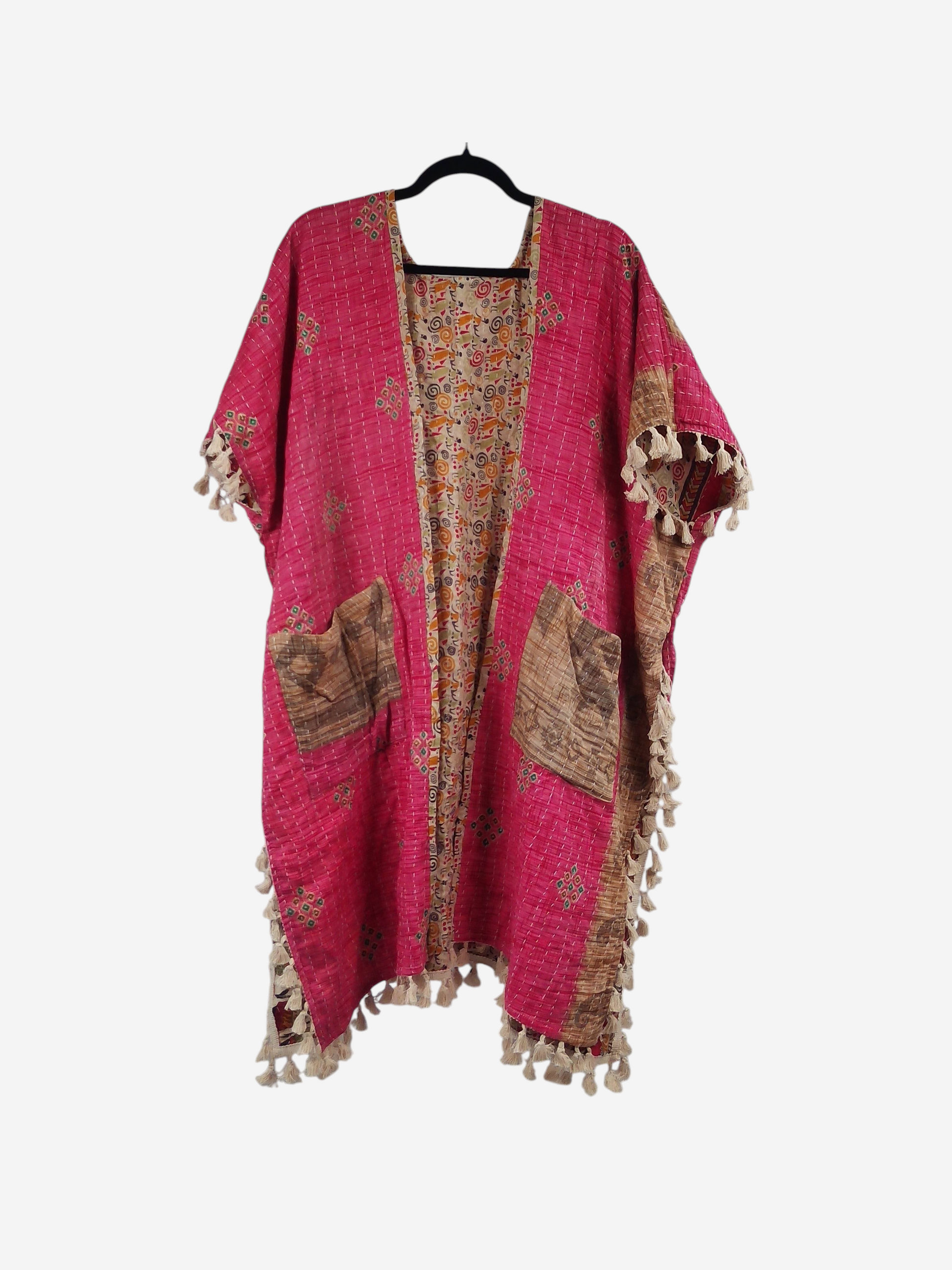 She Lives Beauty pink kantha kimono with short sleeves, fringe trim, and front pockets made from vintage cotton saris