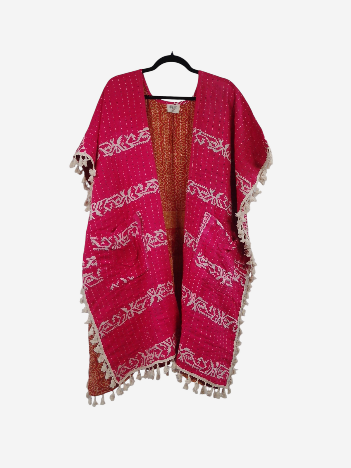 She Lives Beauty short sleeve kimono in fuchsia vintage kantha cotton with white patterns, fringe trim, and pockets.