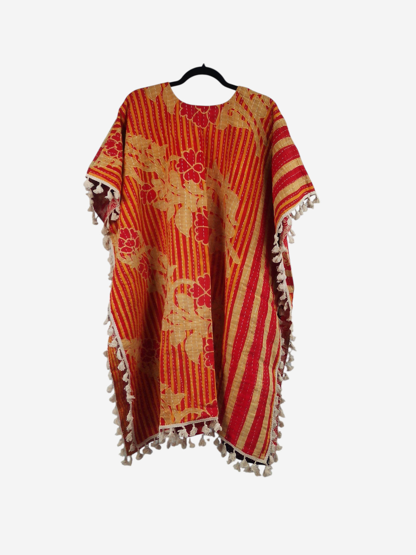 She Lives Beauty vintage cotton kantha kimono in orange and yellow floral print with fringe trim on a hanger
