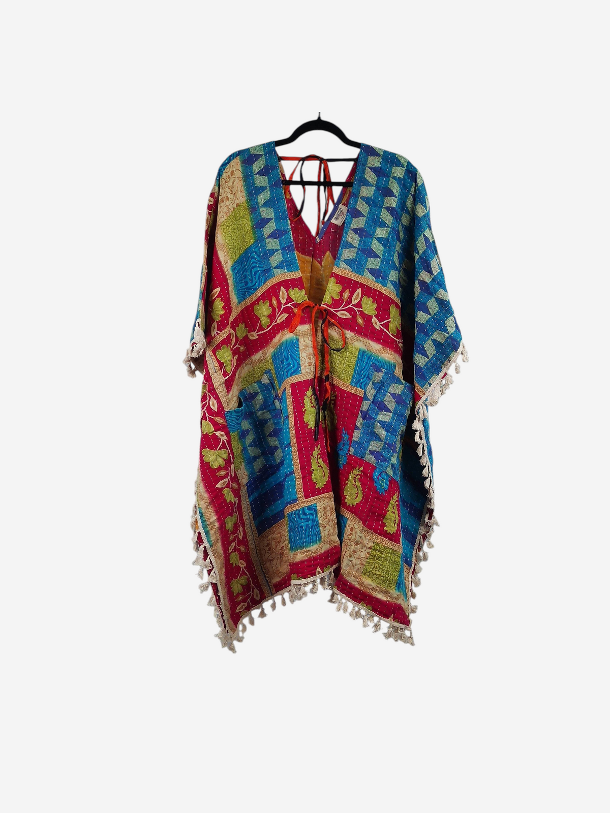 She Lives Beauty reversible long sleeve Kantha kimono in vibrant patchwork cotton with fringe trim and front tie.