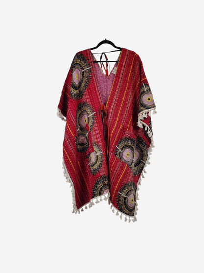 She Lives Beauty reversible red vintage cotton kantha kimono with circular patterns, long sleeves, and fringe trim.