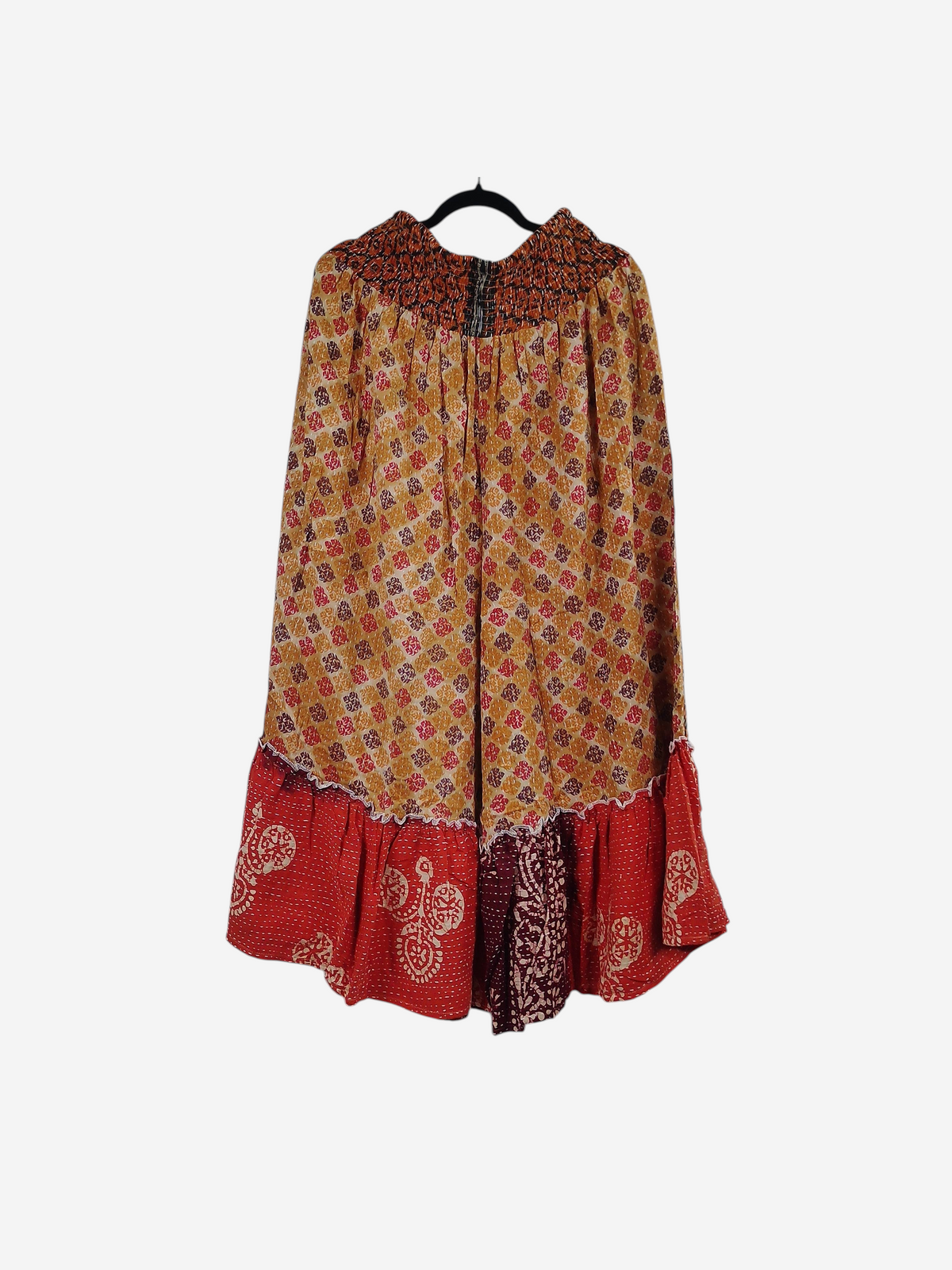 She Lives Beauty Anything for Selenas pants in vintage kantha cotton with a red and gold patterned ruffle hem.