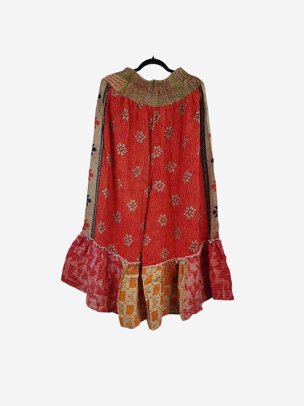 She Lives Beauty Anything for Selenas pants in red vintage kantha cotton with floral patterns and a ruffled hem.