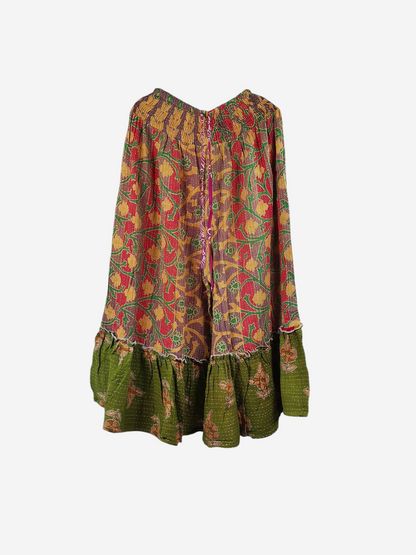 She Lives Beauty Anything for Selenas pants in vintage kantha cotton with floral patterns and a green ruffle hem.