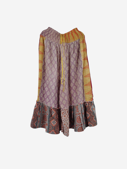 She Lives Beauty Anything for Selenas pants in vintage kantha cotton with a purple, yellow, and patterned ruffle hem.