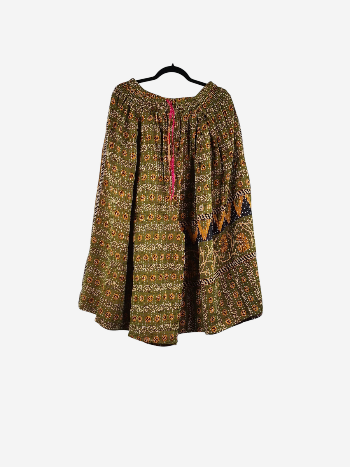 She Lives Beauty Pachuco Kantha capri pants in olive green vintage cotton with intricate floral patterns and pleats.