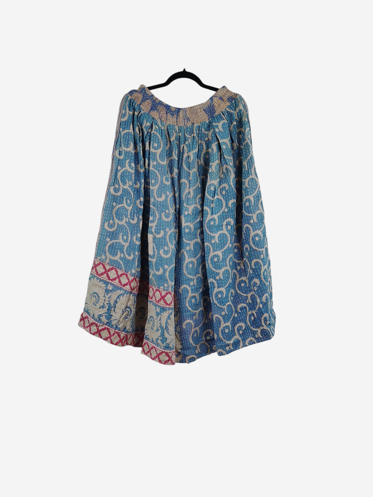 She Lives Beauty Pachuco Kantha capri pants in blue vintage cotton with intricate white swirls and red border details.