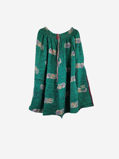She Lives Beauty Pachuco Kantha capri pants in green vintage cotton with colorful floral patterns and pleated detail.