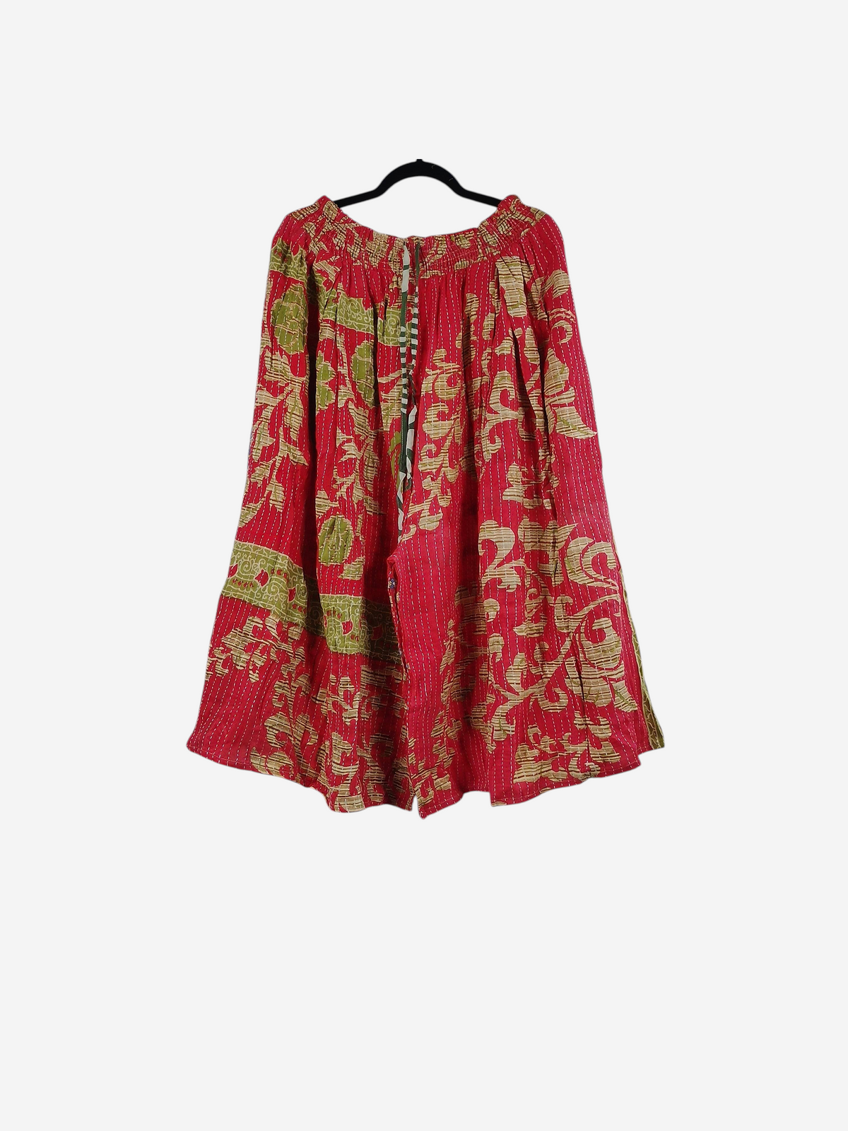 She Lives Beauty Pachuco Kantha capri pants in red and green vintage cotton with floral patterns and pleated design.