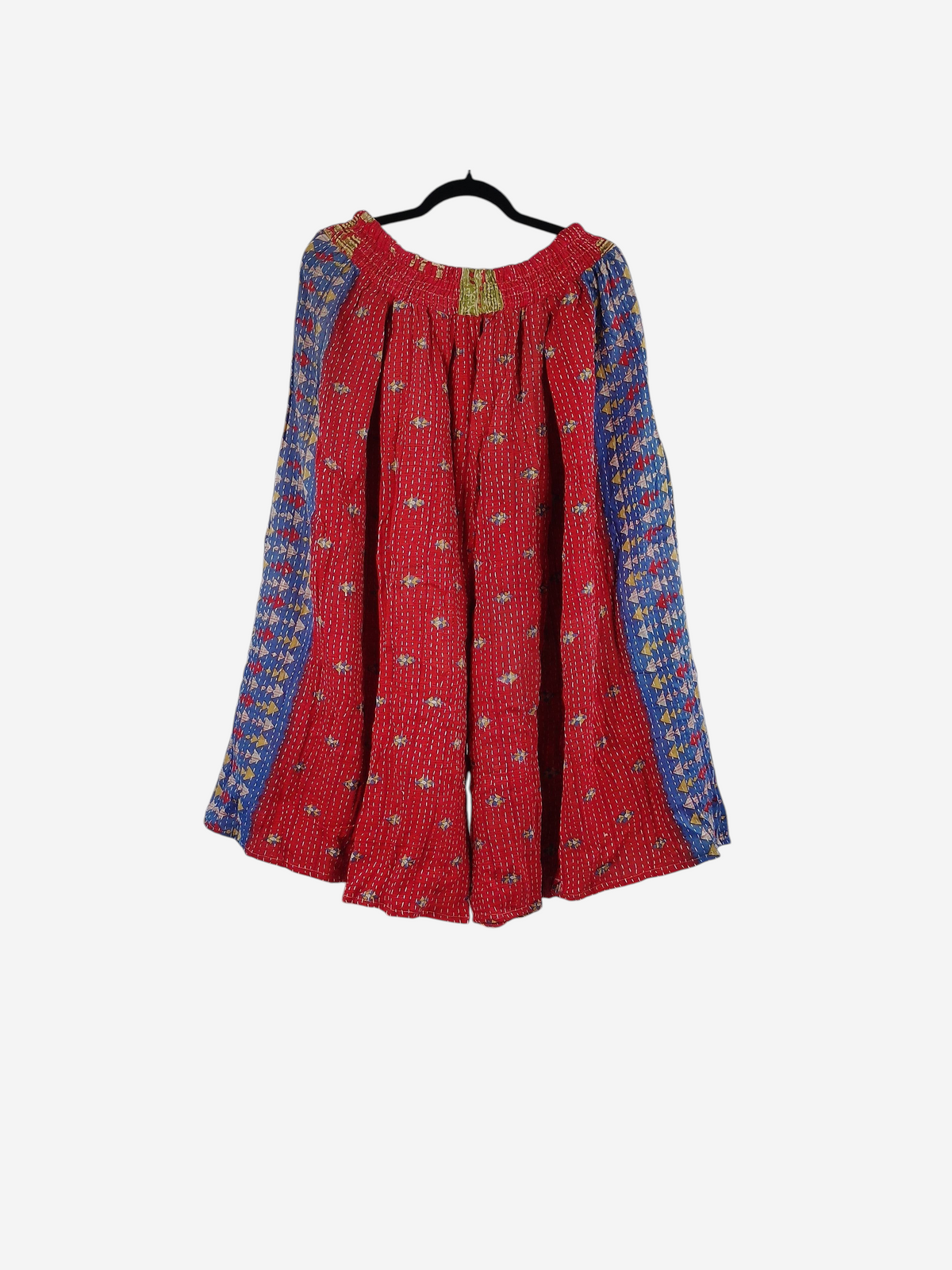 She Lives Beauty Pachuco Kantha capri pants in red vintage cotton with blue patterned side panels and pleated detail.