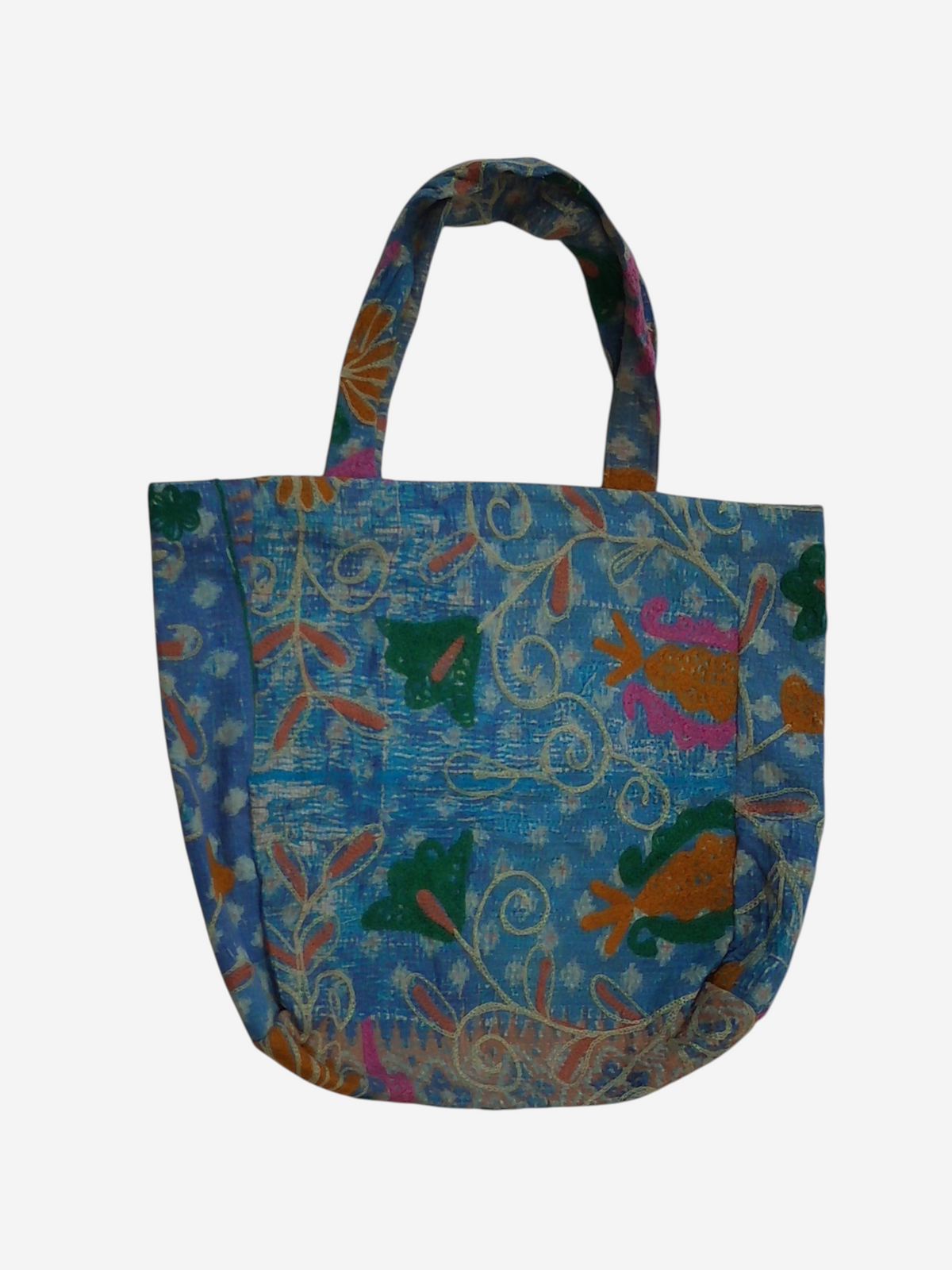 She Lives Beauty vintage Kantha and Suzani cotton tote bag featuring blue patchwork with colorful floral embroidery.