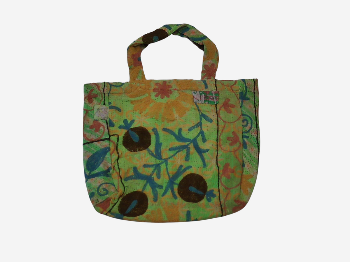 She Lives Beauty bohemian tote bag made from vintage green and orange Kantha patchwork with intricate Suzani embroidery