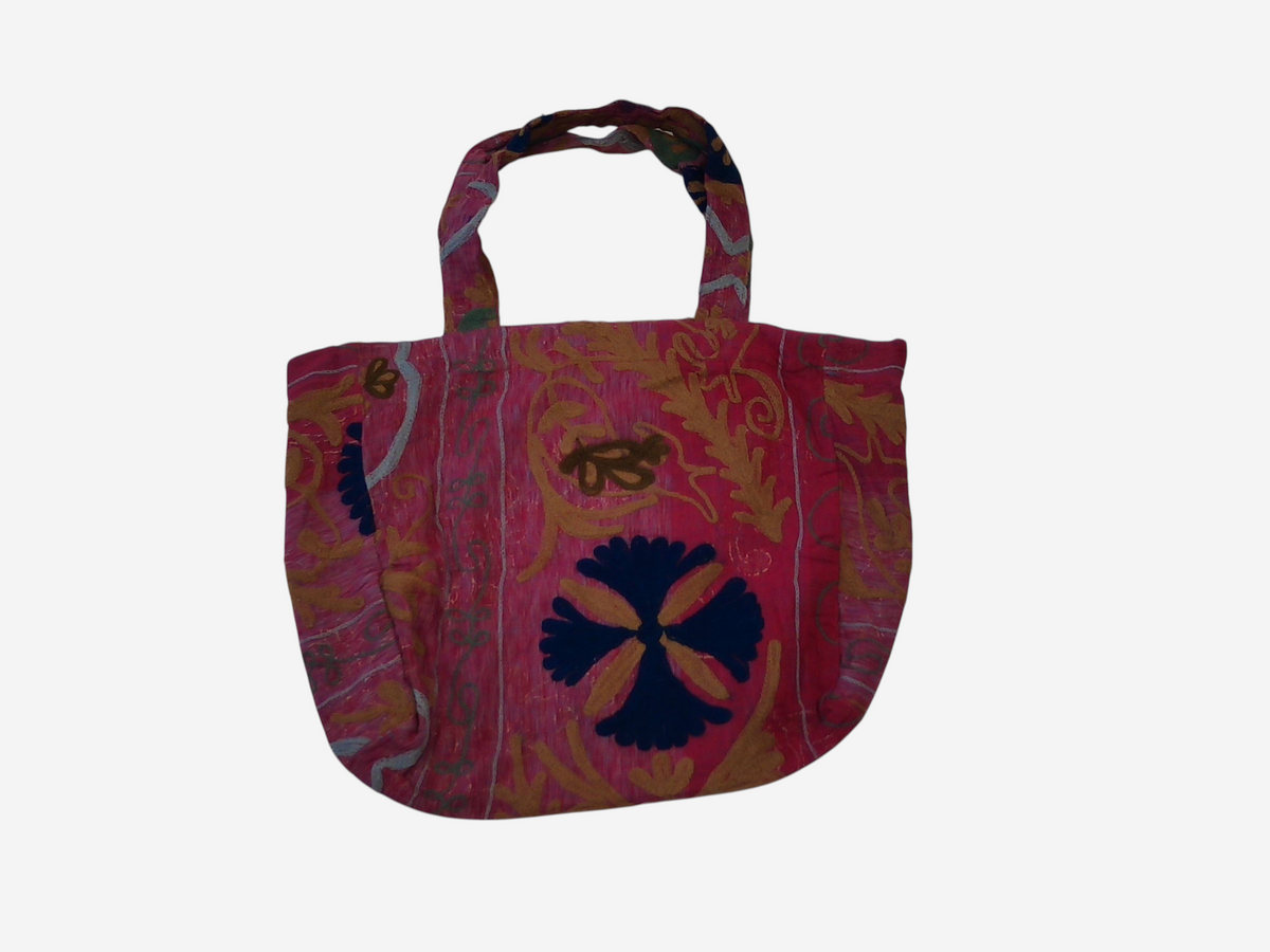 She Lives Beauty bohemian Kantha Suzani tote bag in pink cotton with intricate vintage patchwork and embroidery
