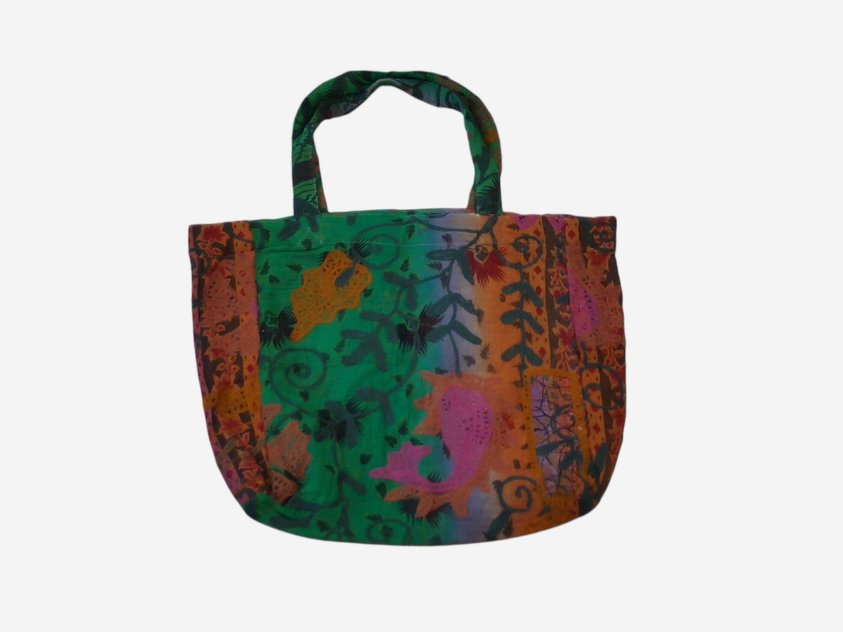 She Lives Beauty bohemian tote bag made from vintage green and orange Kantha and Suzani patchwork cotton textiles.