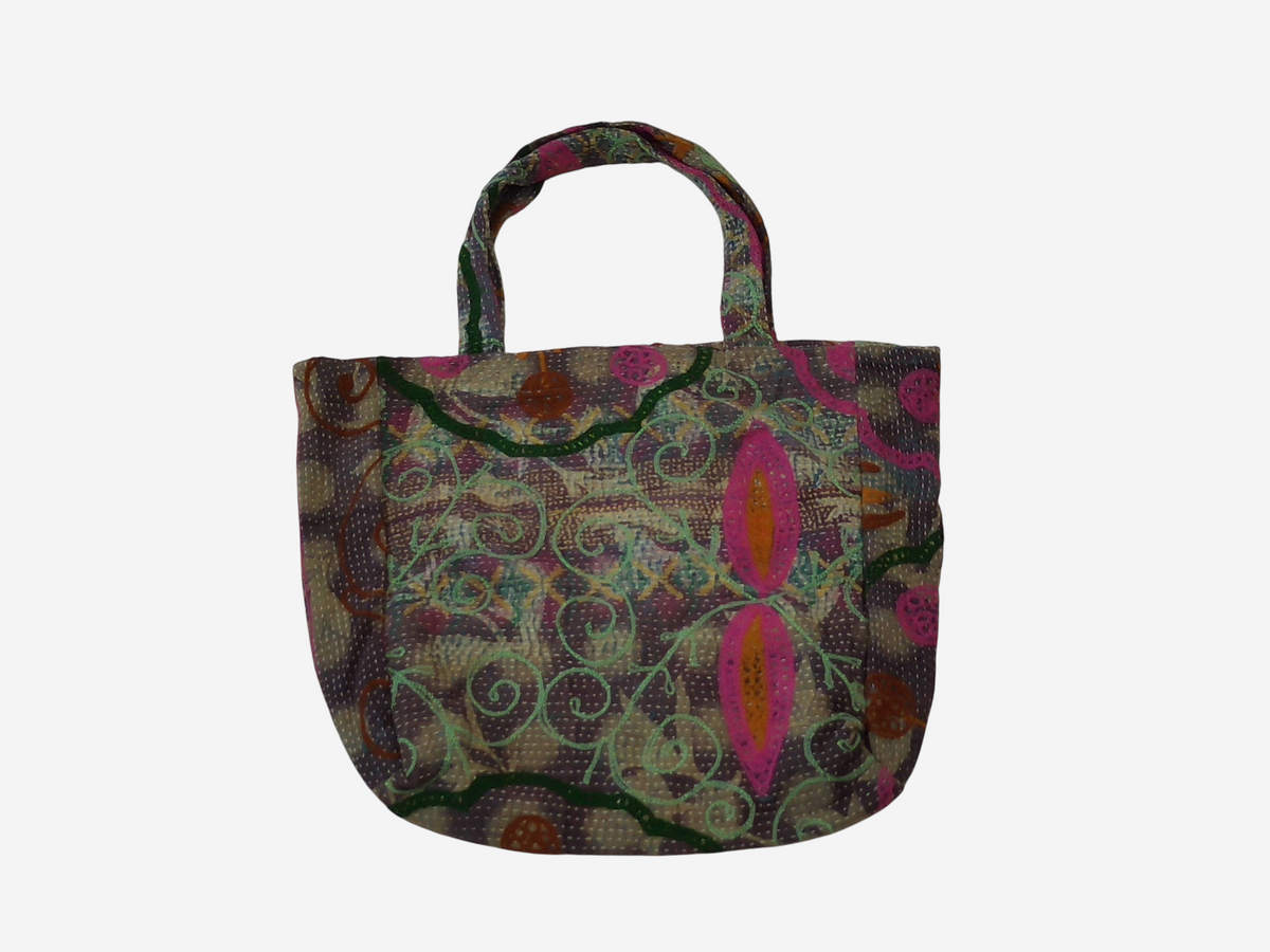 She Lives Beauty vintage Kantha and Suzani patchwork tote bag with intricate embroidery and faded floral patterns