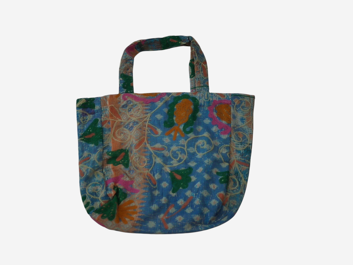 She Lives Beauty bohemian tote bag made from vintage blue Kantha and Suzani patchwork cotton textiles.