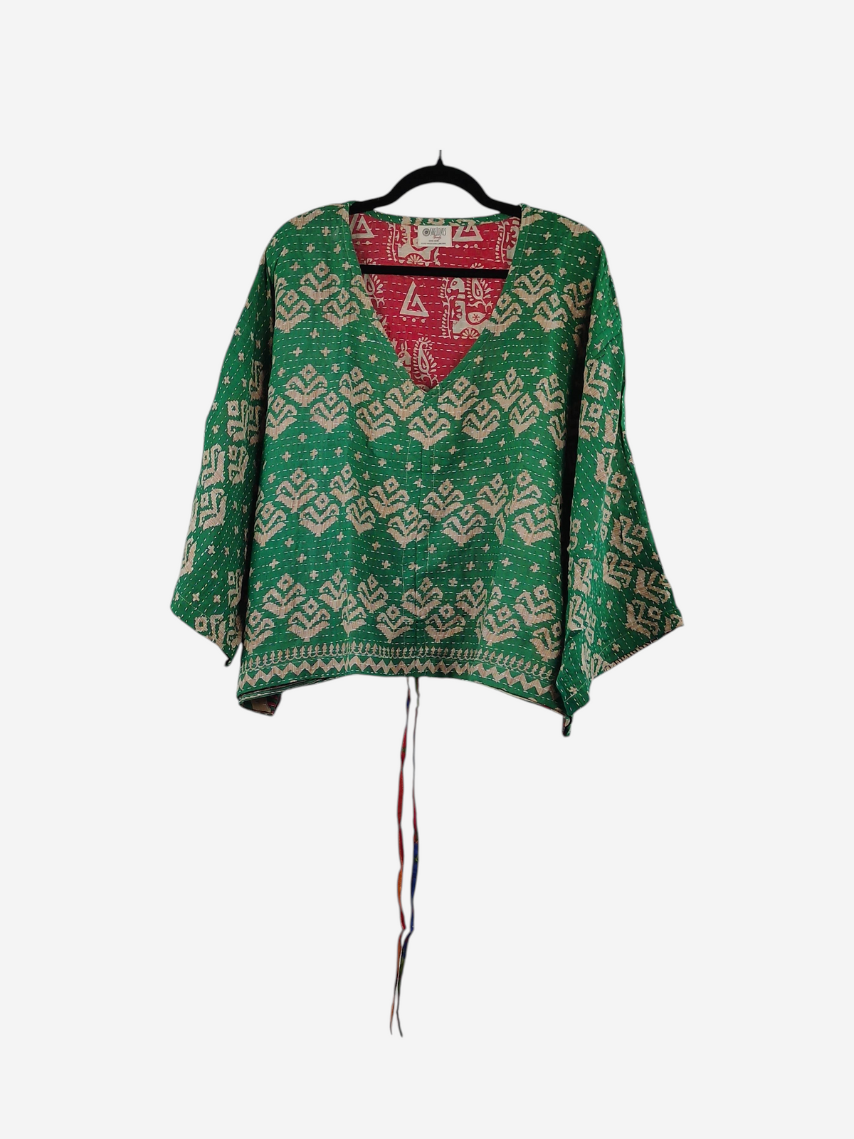 She Lives Beauty Sunrise Hana butterfly top in green and cream vintage kantha cotton with a red patterned v-neck