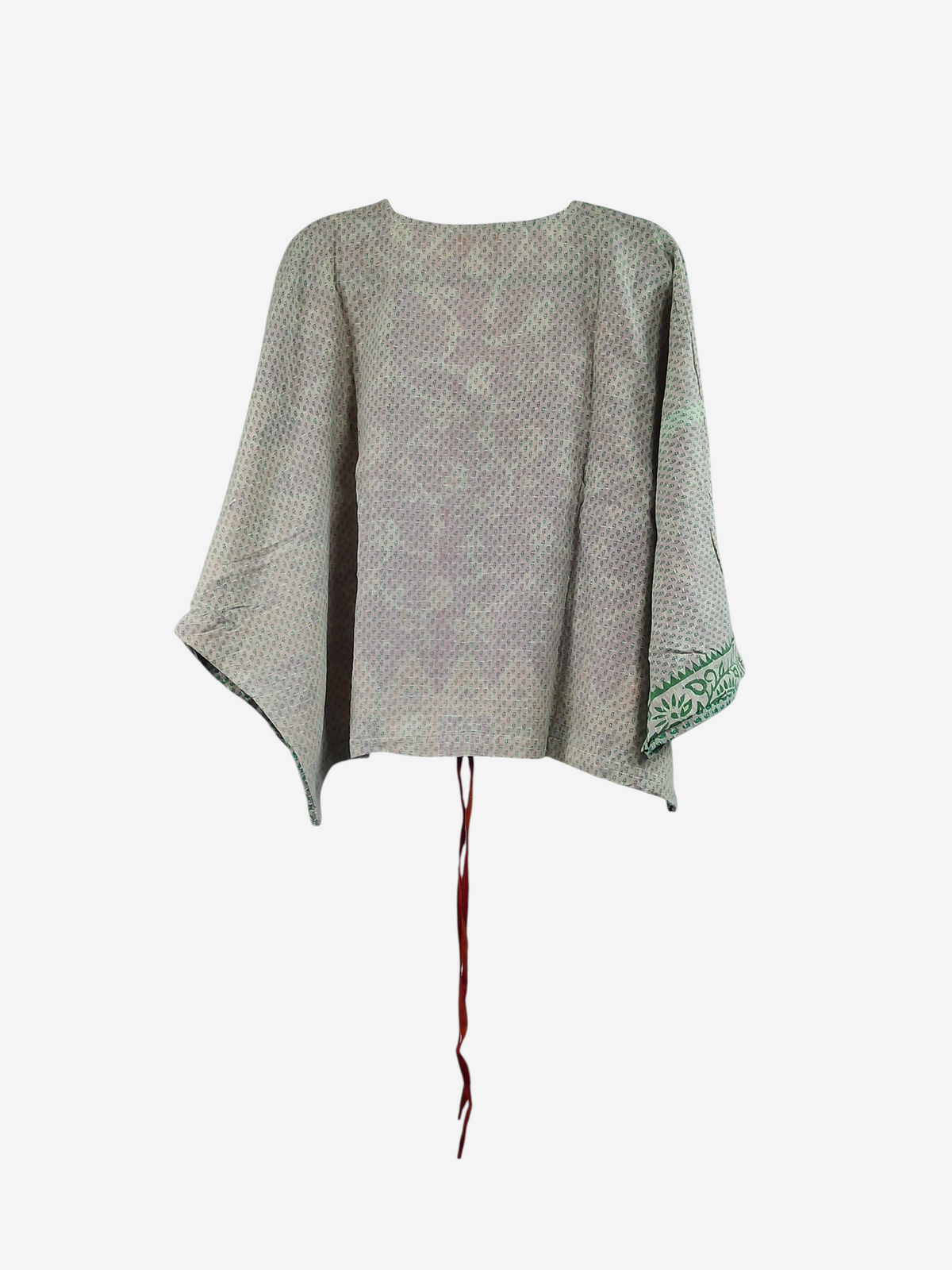 She Lives Beauty Sunrise Hana butterfly top in vintage cotton with light patterned fabric and green sleeve detail.