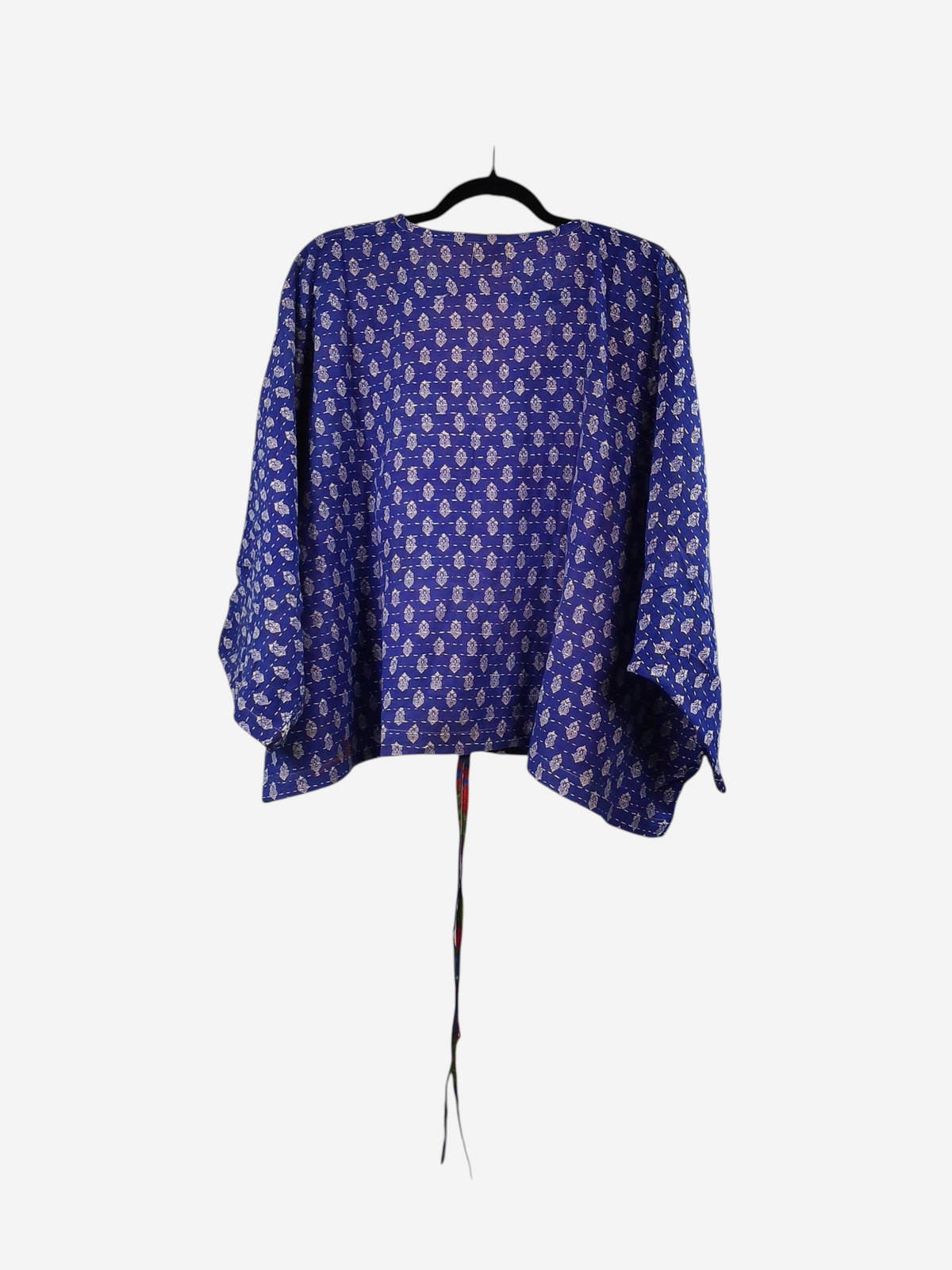 She Lives Beauty Sunrise Hana butterfly top in blue vintage cotton with intricate white and pink kantha stitching.