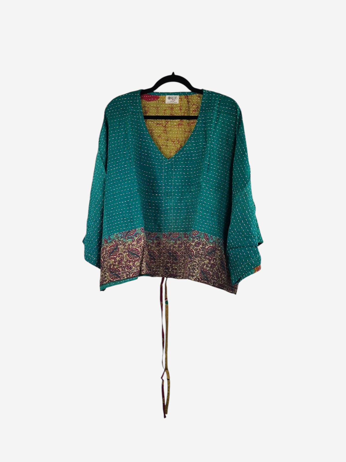 She Lives Beauty Sunrise Hana butterfly top in teal vintage cotton with kantha stitching and a patterned hem.