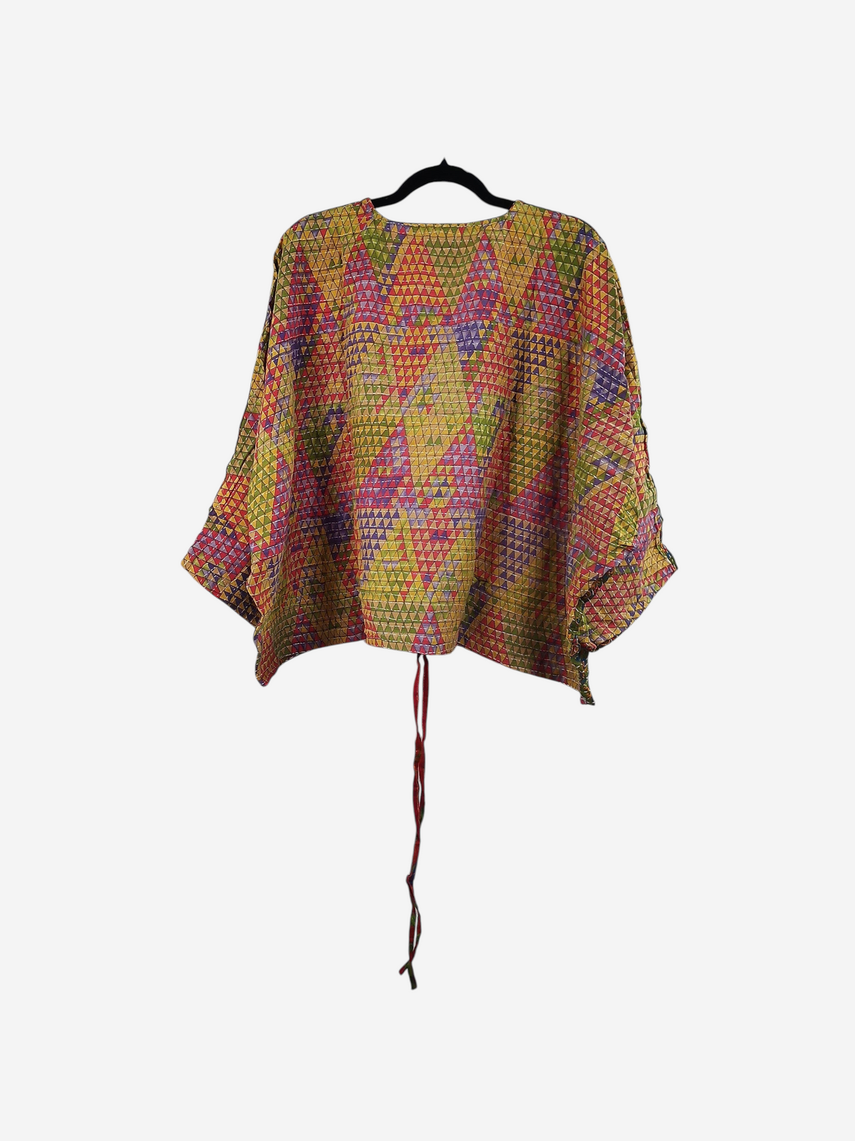 She Lives Beauty Sunrise Hana butterfly top in vintage cotton with vibrant yellow, pink, and purple geometric patterns.