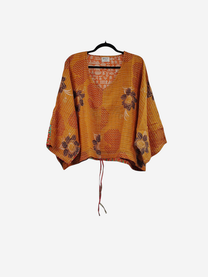 She Lives Beauty Sunrise Hana butterfly top in orange vintage kantha cotton with floral patterns and hand stitching.
