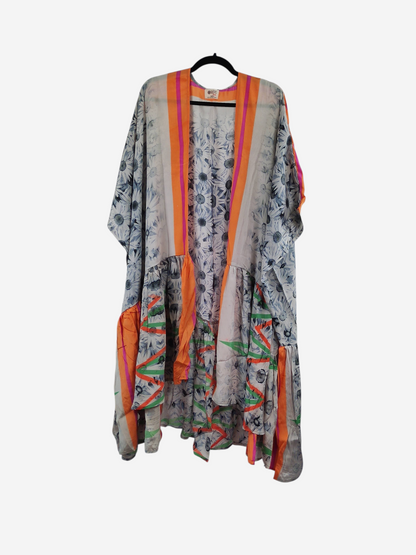 She Lives Beauty Winds of the Ancestors kimono made from vintage rasgulla silk with floral patterns and orange trim.