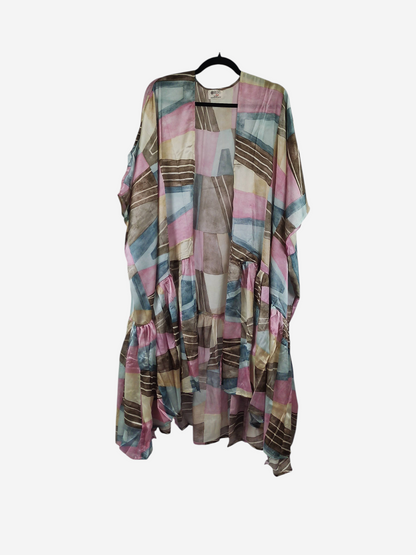 She Lives Beauty Winds of the Ancestors kimono in a patchwork of pink, blue, and brown vintage rasgulla silk.