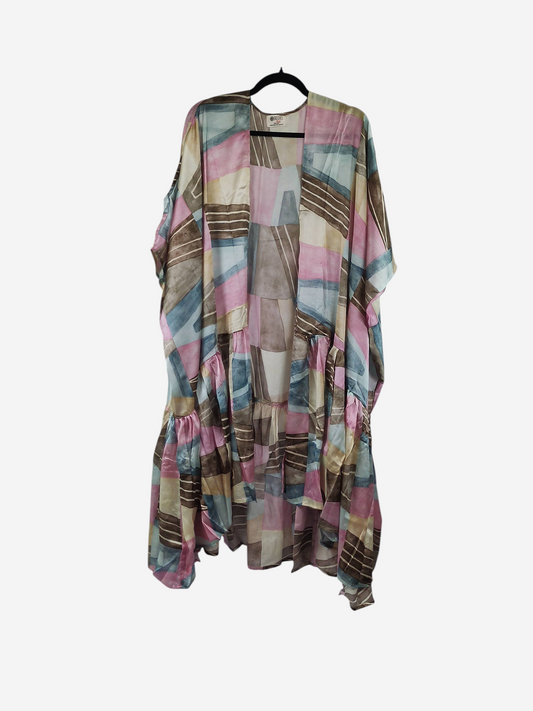 She Lives Beauty Winds of the Ancestors kimono in a patchwork of pink, blue, and brown vintage rasgulla silk.